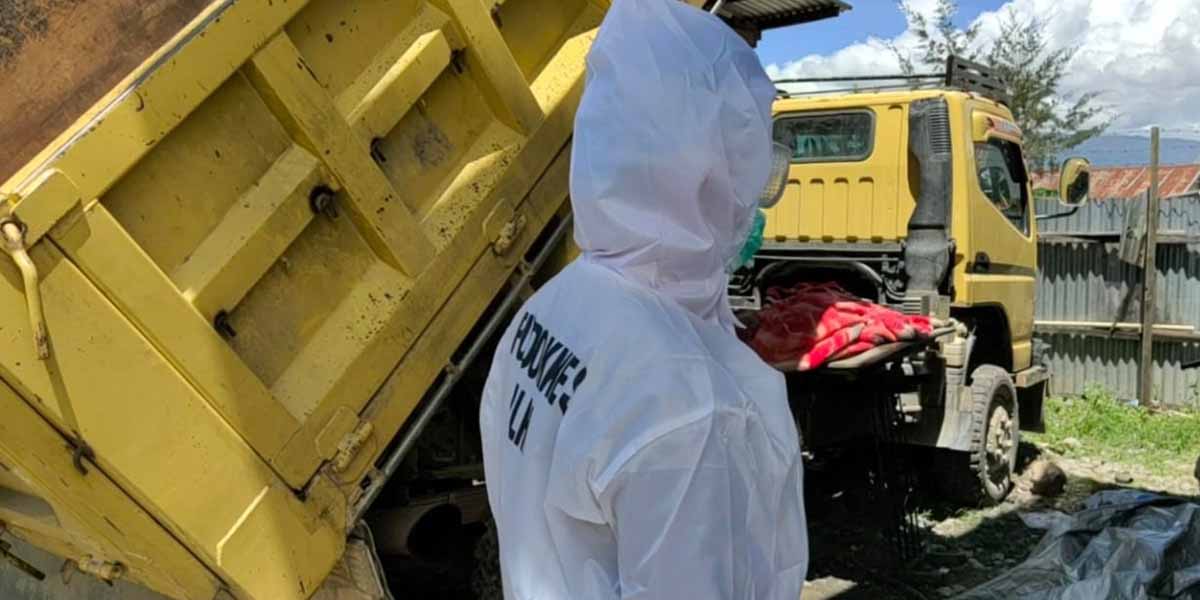 sesosok-mayat-ditemukan-tertindih-bak-truk-di-wamena